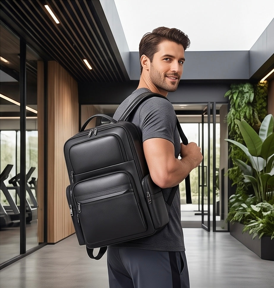Q-ENORMOUS Genuine Leather Backpack – 40L Anti-Theft Travel & Laptop Bag with USB Charging Port