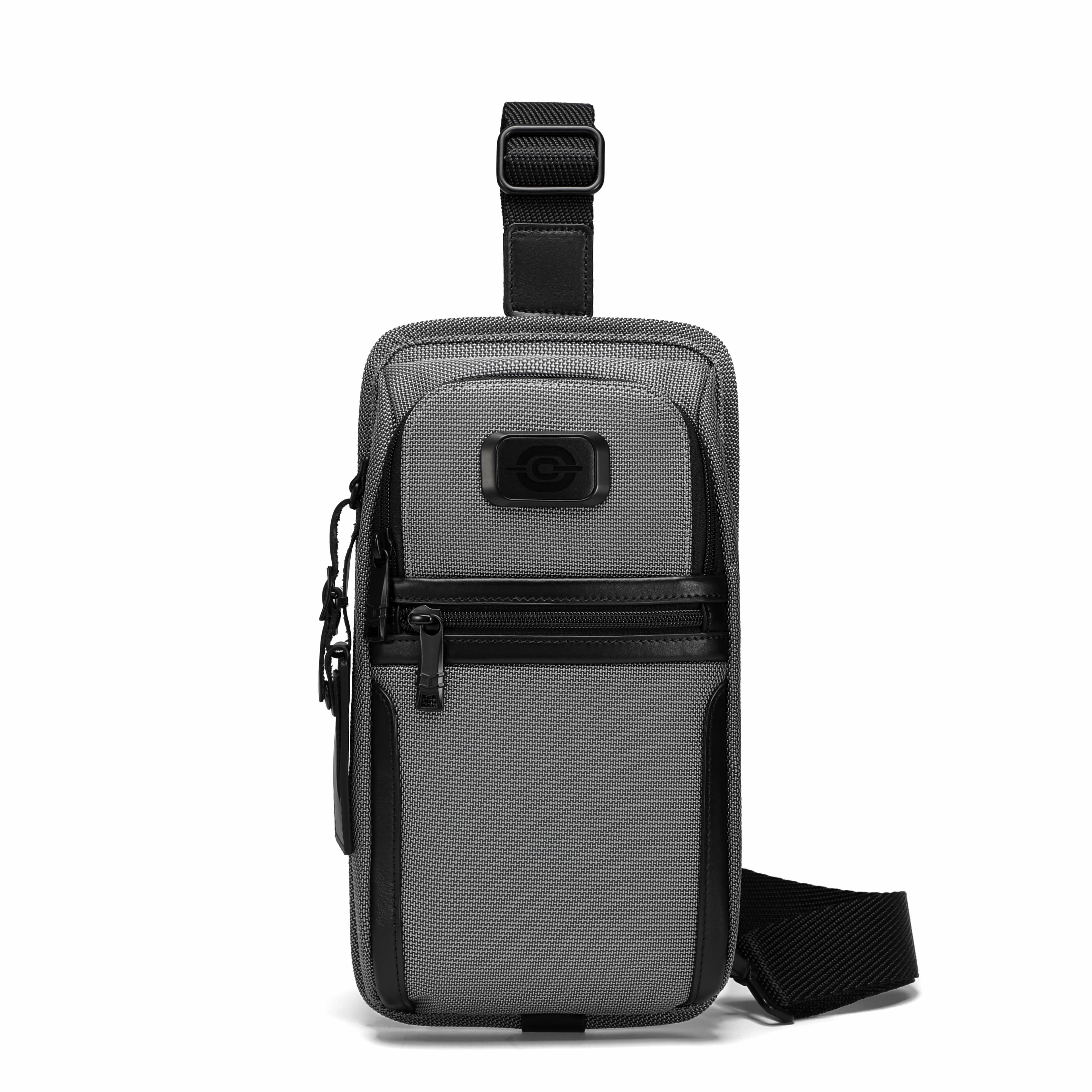 A gray and black crossbody phone bag with a front zippered pocket and a top handle, shown against a plain white background.