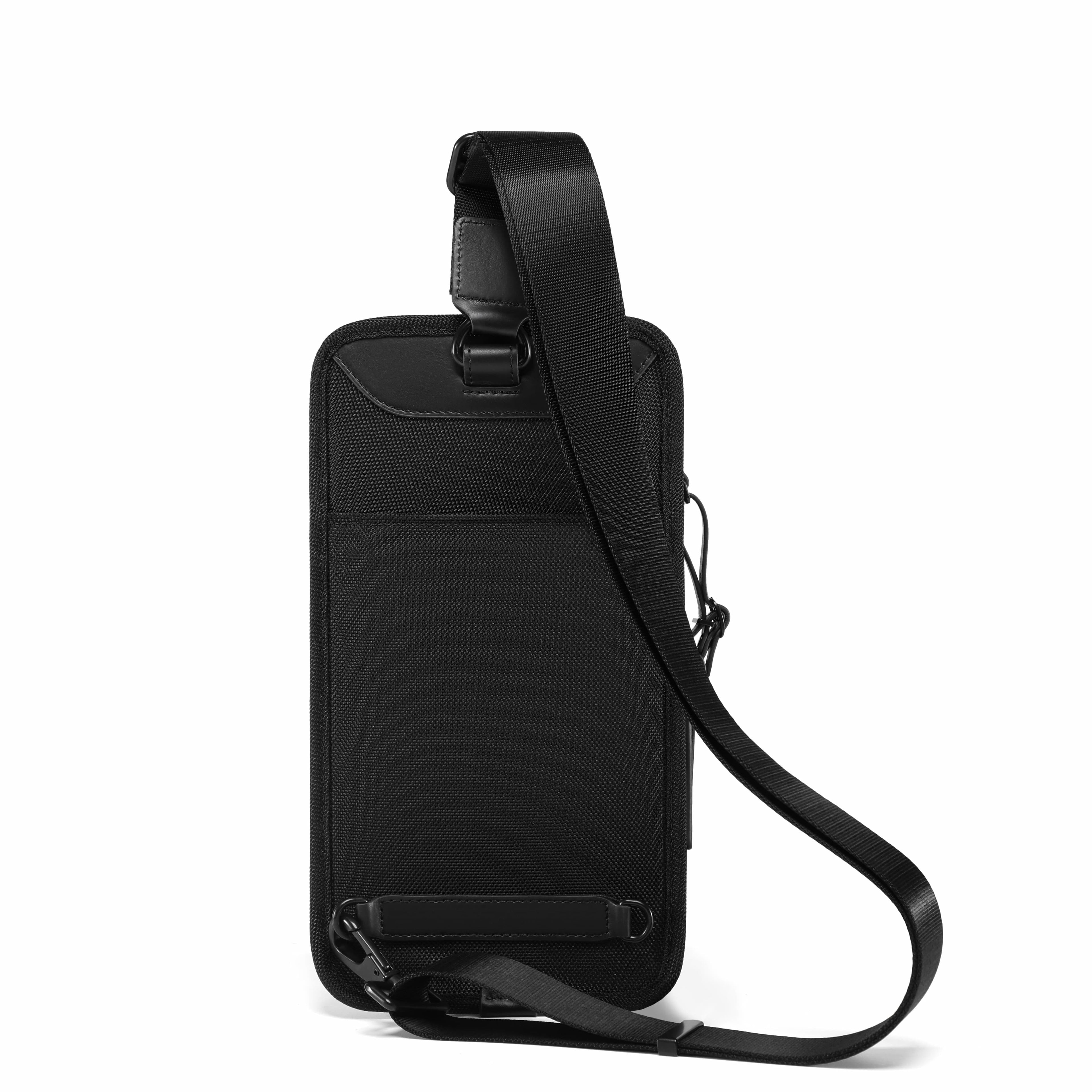 A black nylon shoulder bag with a matching adjustable strap, shown from the back against a solid white background.