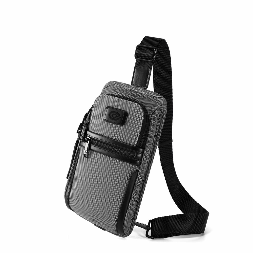 A dark gray and black crossbody phone bag with an adjustable shoulder strap, shown from a three-quarters angle on a white background.