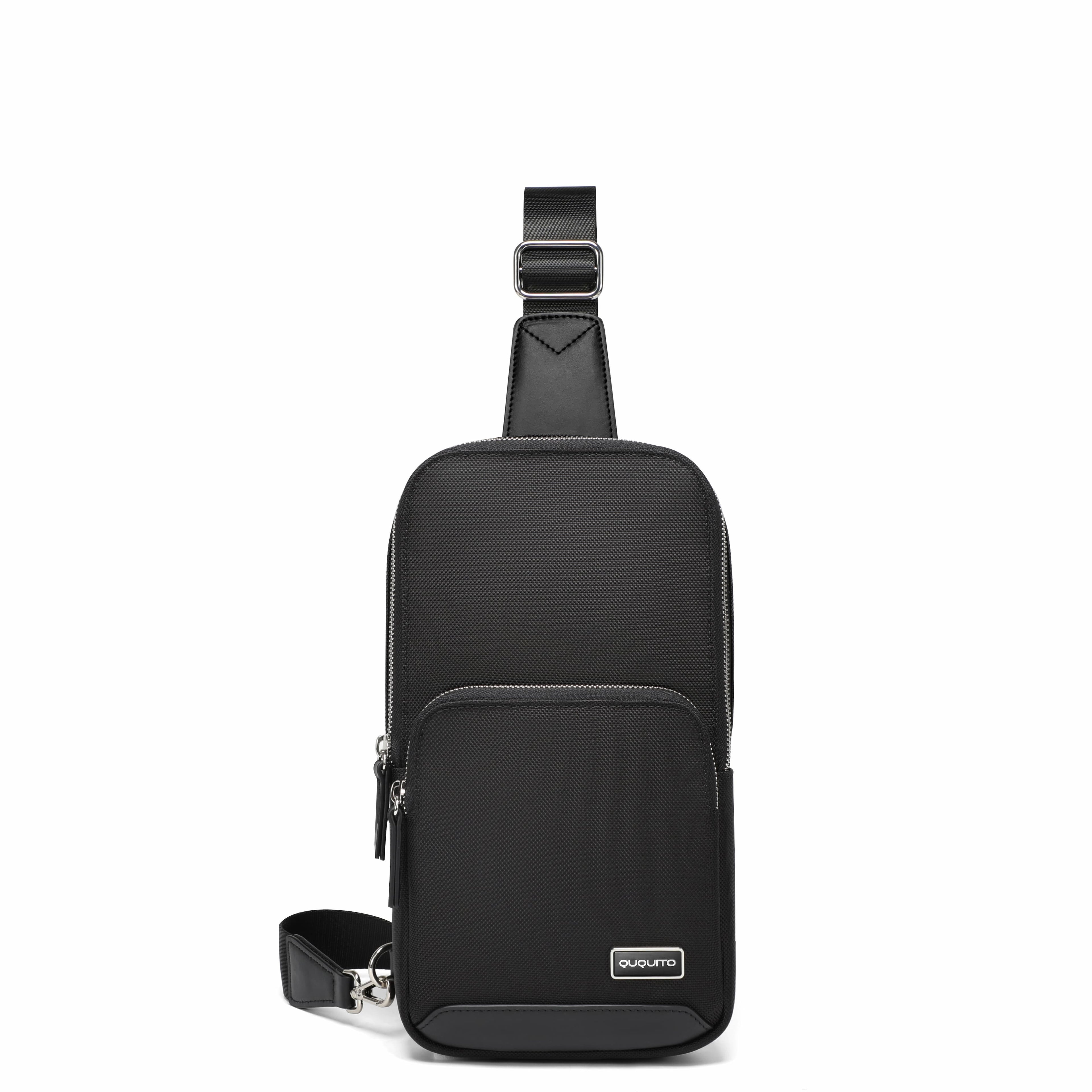 A black nylon sling backpack with a front zippered pocket and an adjustable shoulder strap, shown on a plain white background.