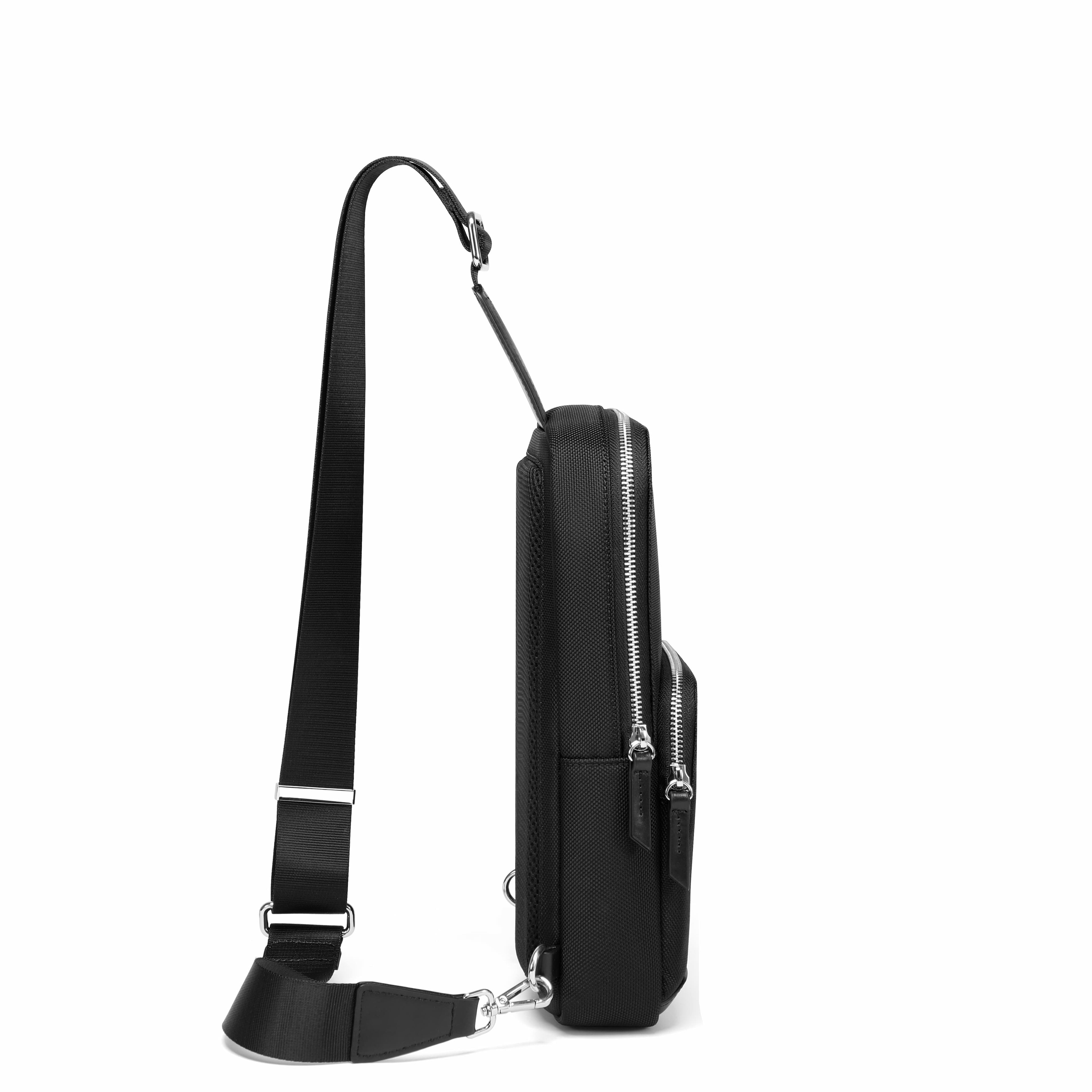 A black nylon shoulder bag with a long adjustable strap and silver-tone hardware, shown from a side profile view on a solid white background.