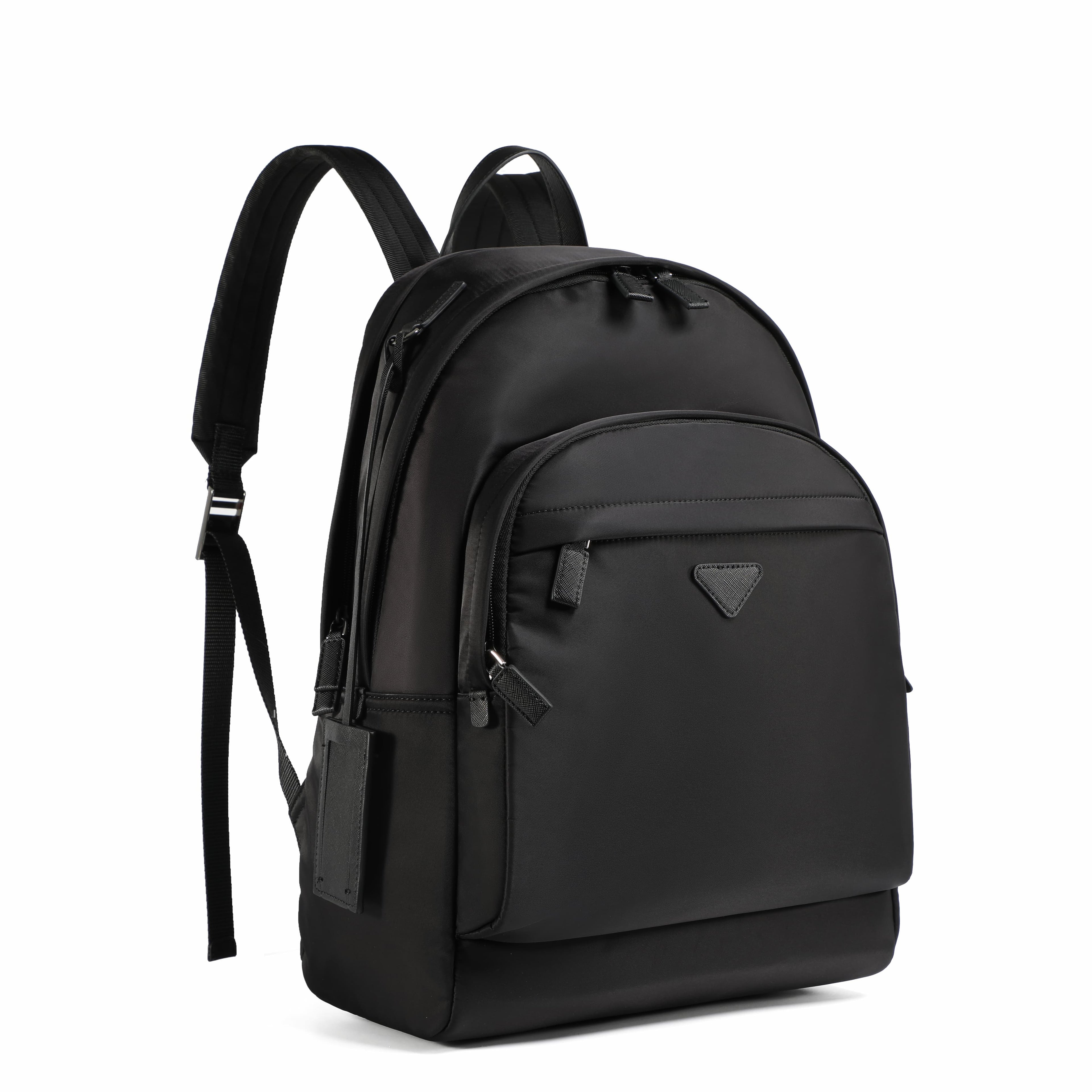 A black nylon backpack with a front zippered pocket and a small triangular logo plaque, shown on a plain white background.