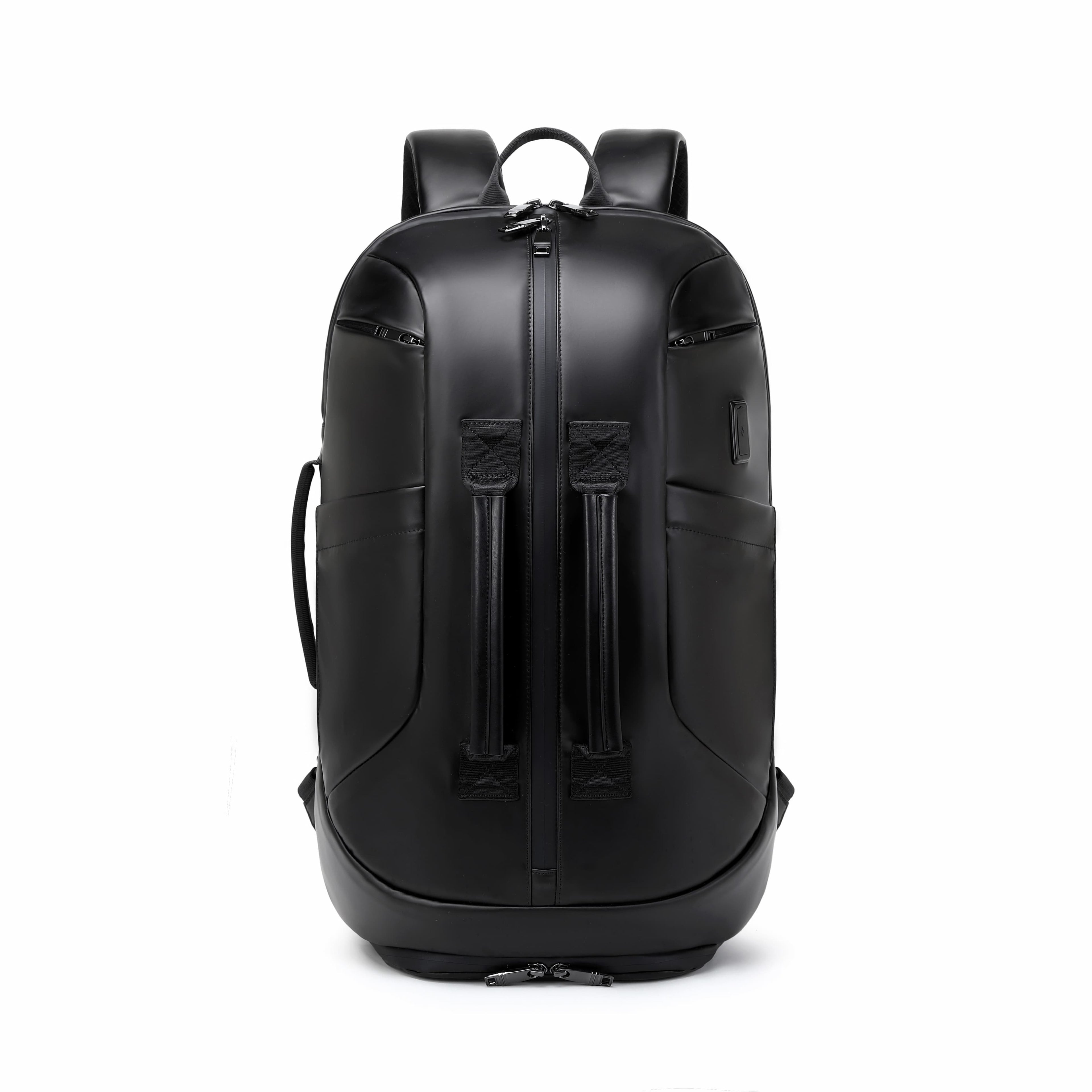 A black leather backpack with dual vertical front zipper compartments, shown from the back on a solid white background.