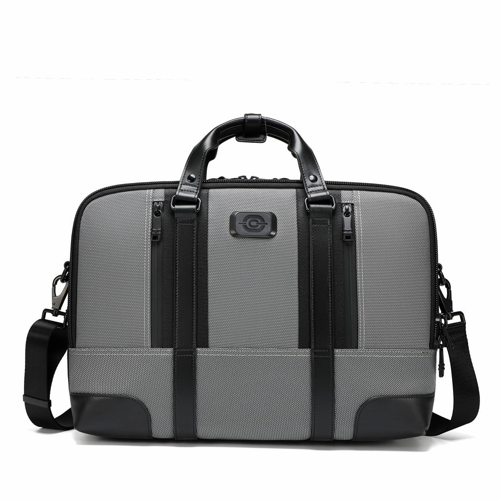 A gray and black laptop briefcase with dual top handles, a detachable shoulder strap, and a textured front panel, shown on a plain white background.