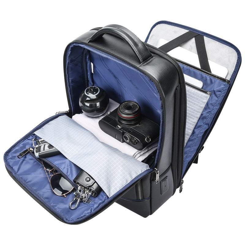 Q-RIDER Expandable Genuine Leather Backpack – Anti-Theft, USB Charging & TSA Lay-Flat