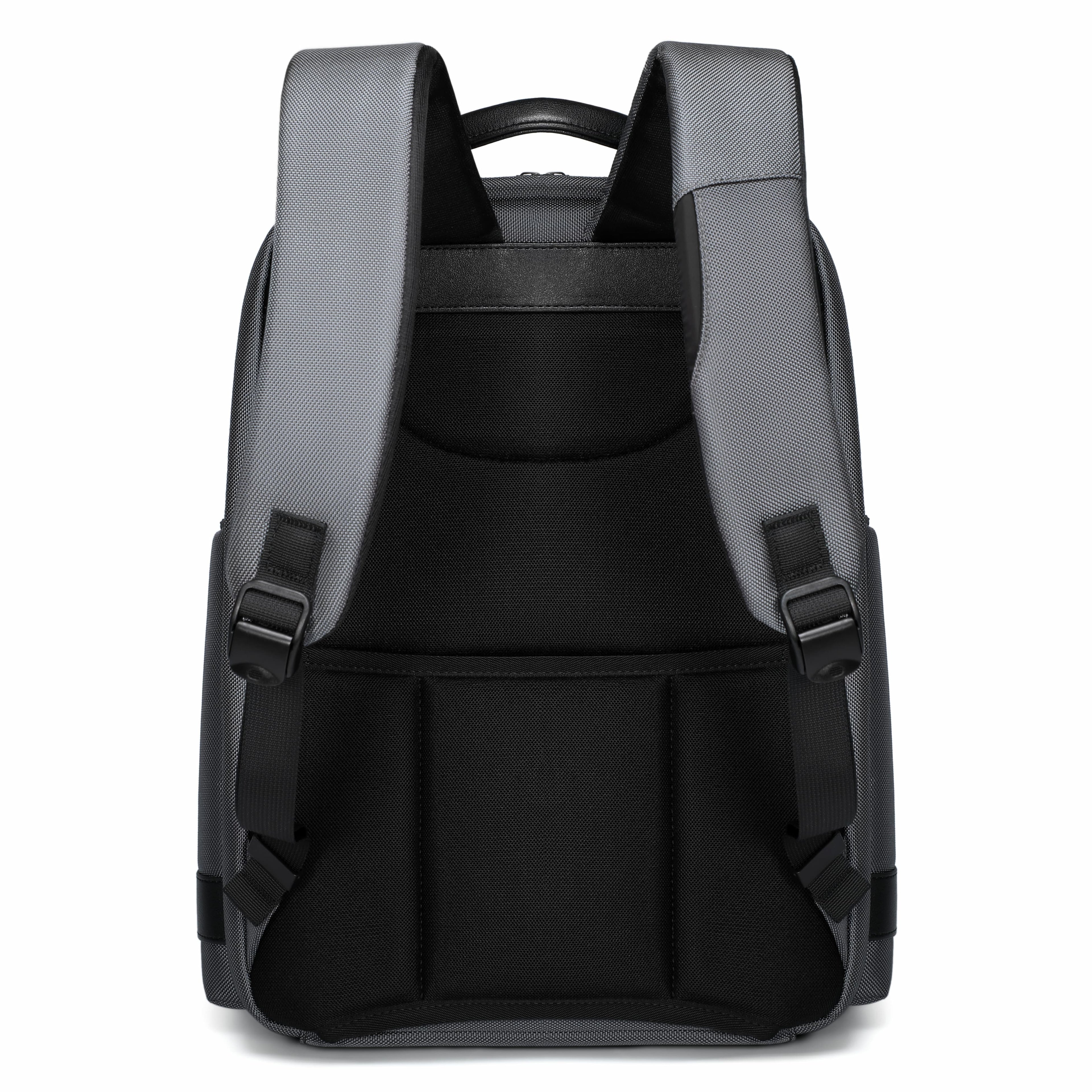 The back view of a black and gray backpack on a solid white background.