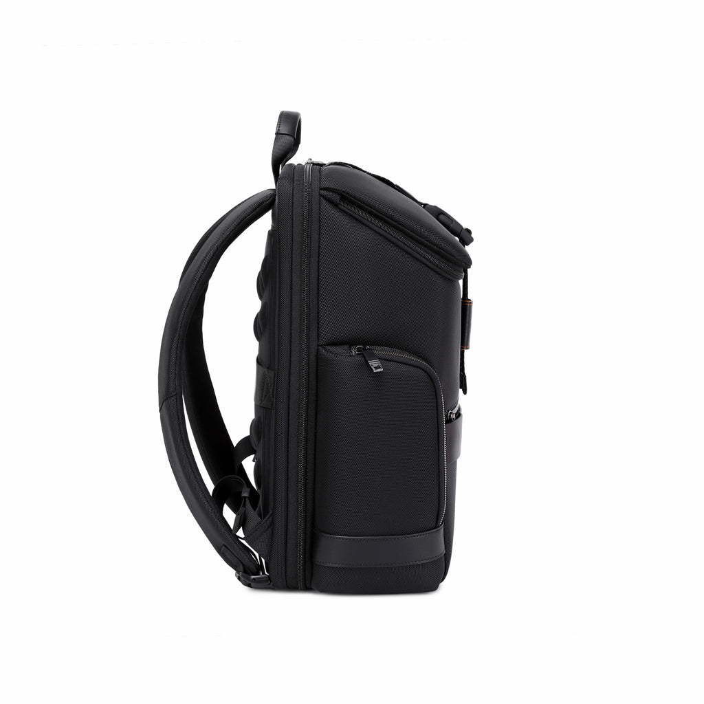 A black backpack shown from the side profile against a solid white background.