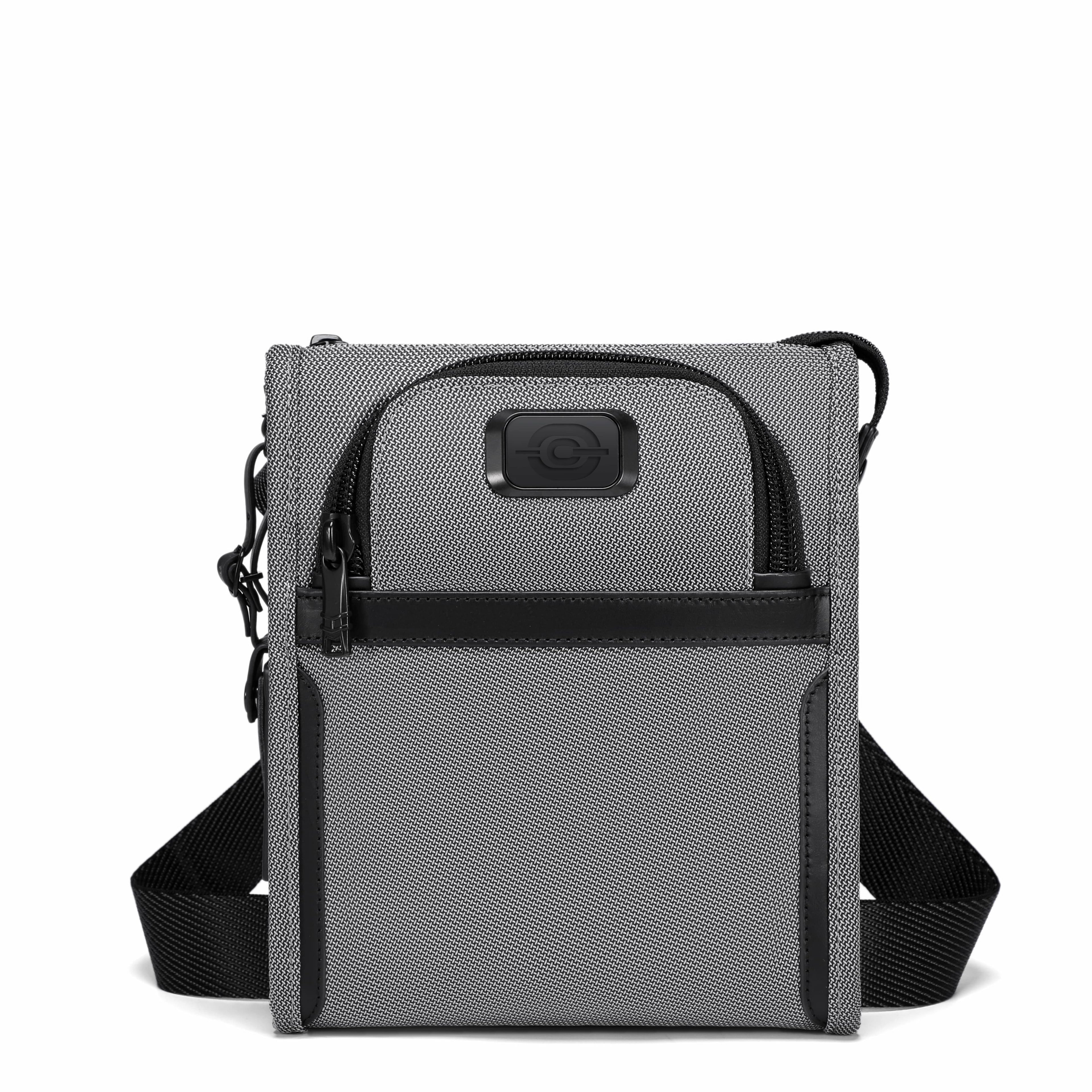 A gray and black crossbody tablet bag with a textured front pocket, a front zippered compartment, and an adjustable shoulder strap, shown on a plain white background.