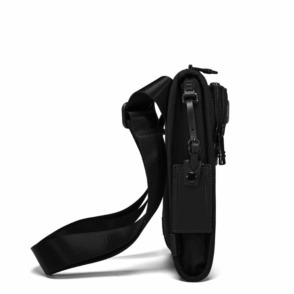 A black tactical shoulder bag shown from a side profile view against a solid white background.