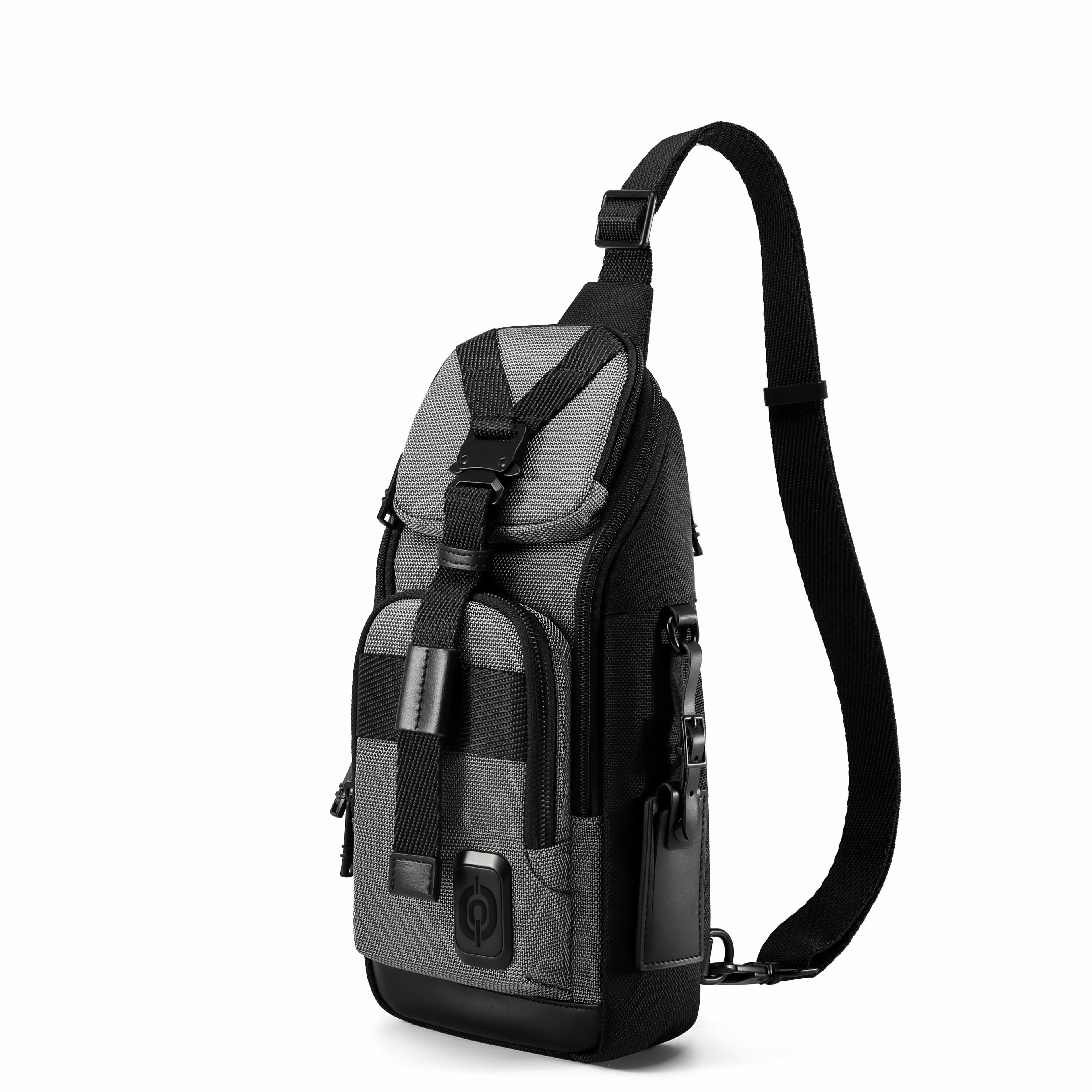 A gray and black sling backpack with a single shoulder strap, shown from a three-quarter angle on a solid white background.