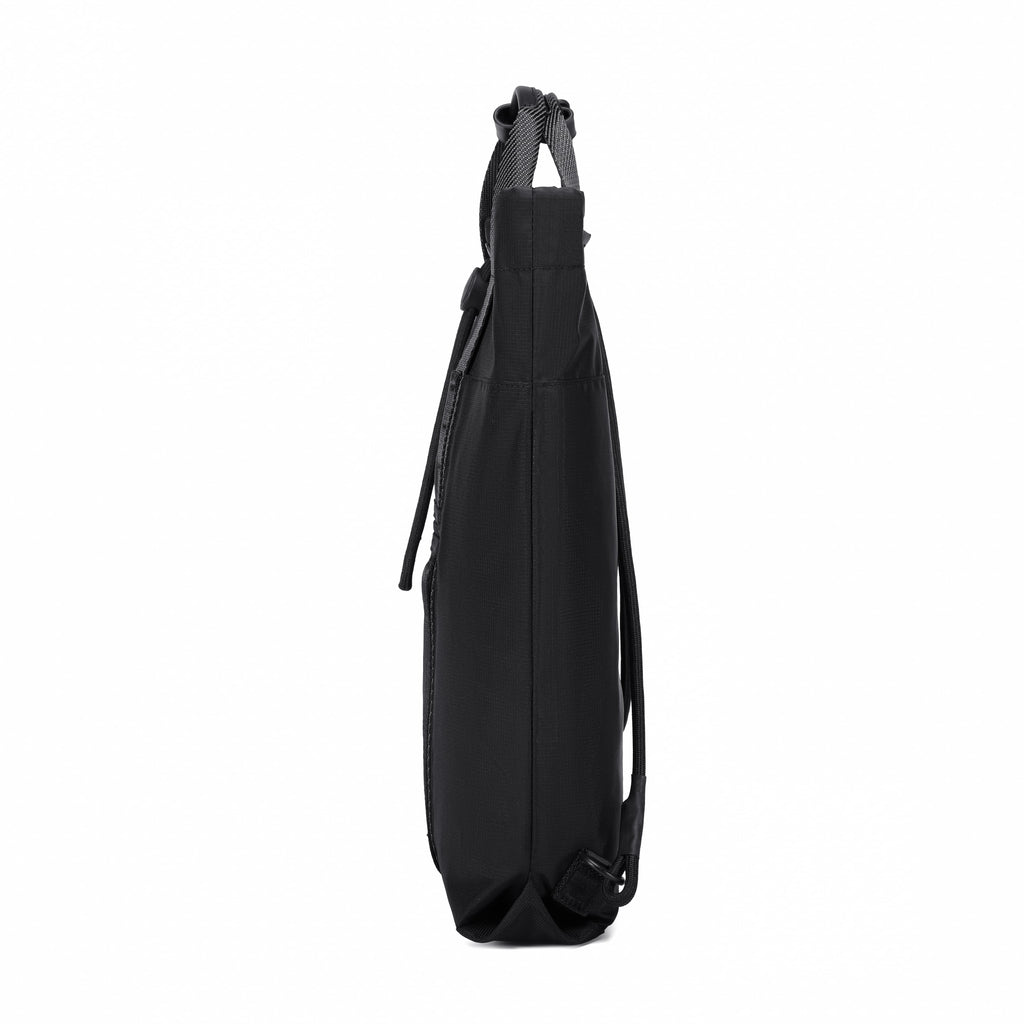 A black fabric shoulder bag shown from a side profile view against a solid white background.
