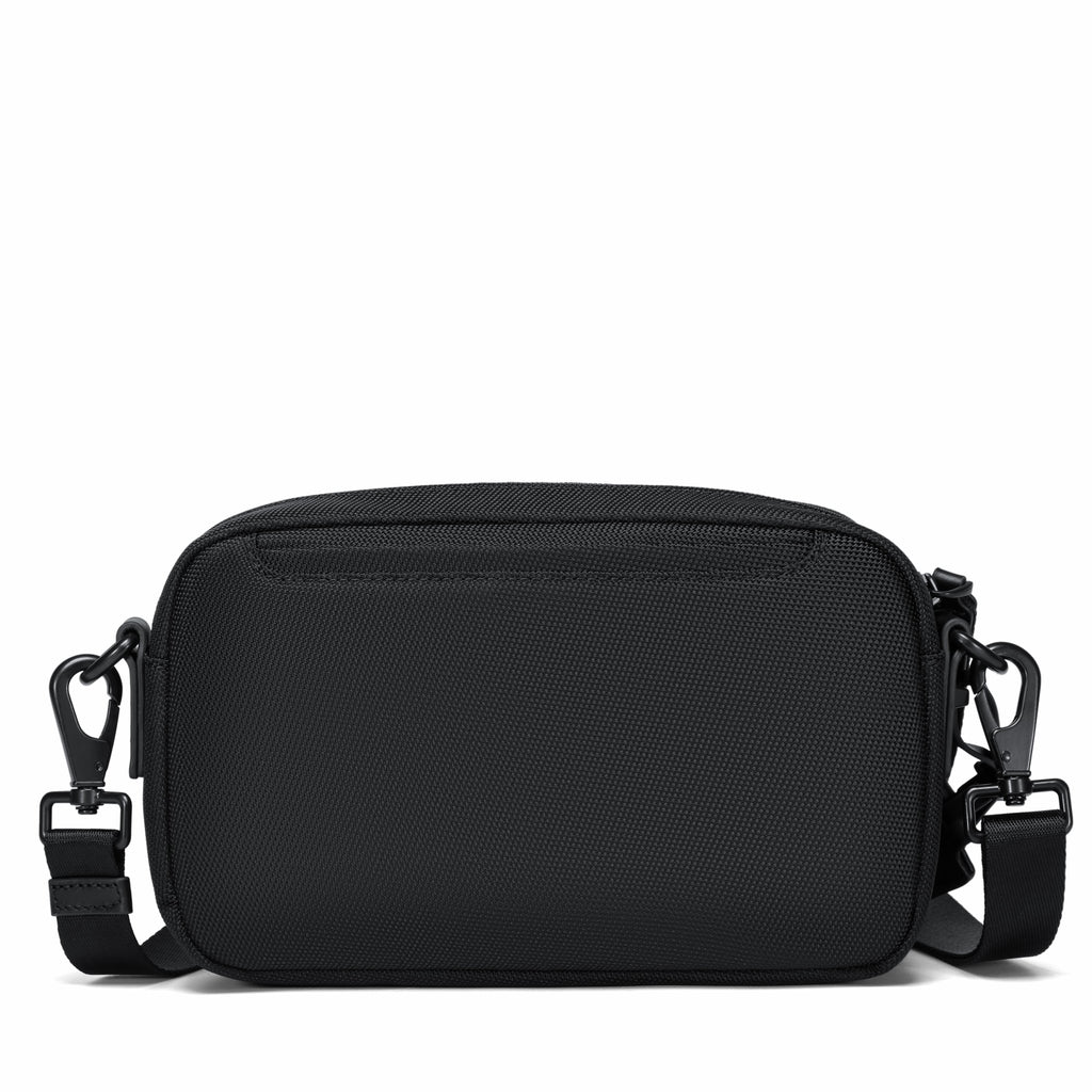A black textured nylon crossbody bag with an adjustable shoulder strap and metal clips, shown against a plain white background.